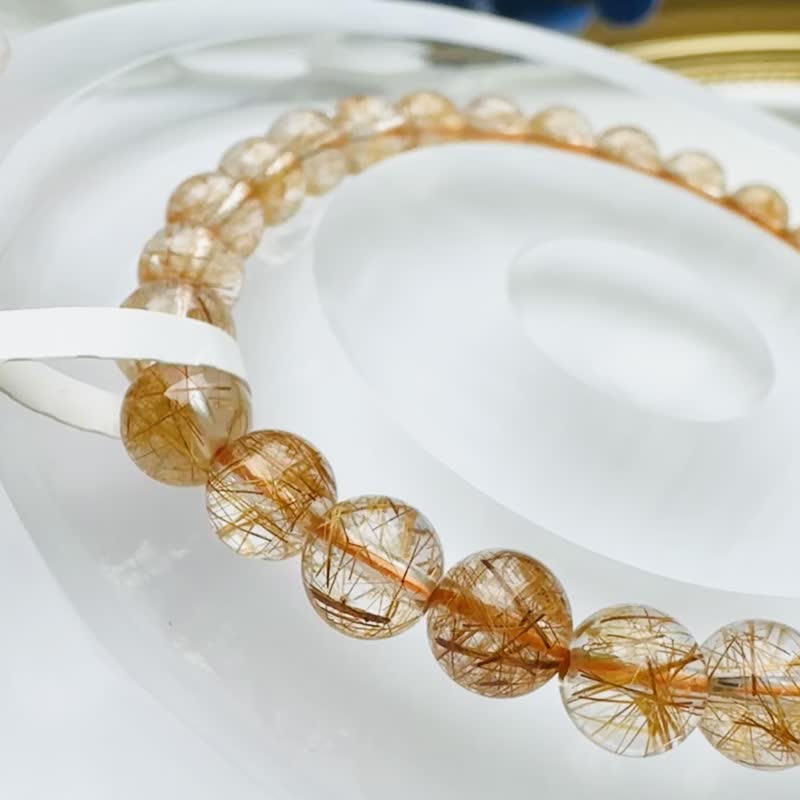 精品玻璃轻透料金闪闪铜发 6.3-6.8mm11.78g 辟邪挡煞逢凶化吉化解 - 手链/手环 - 水晶 金色